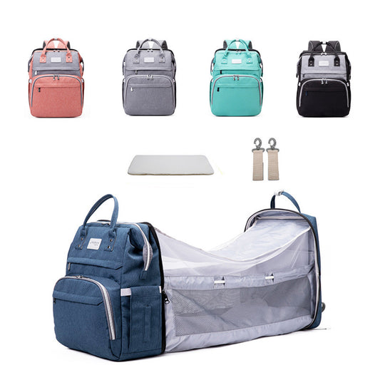 Spacious Diaper Bag with Built-in Foldable Crib