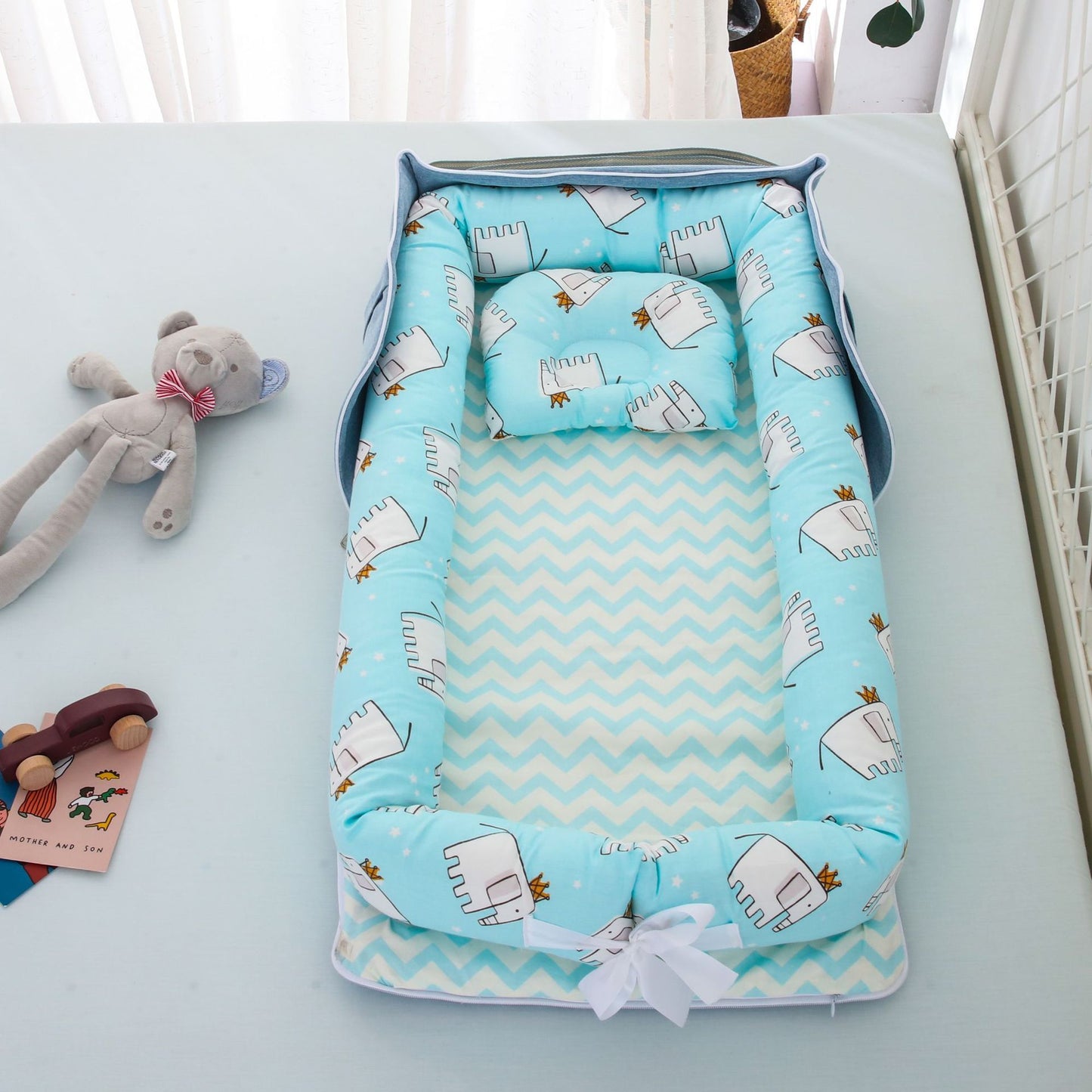Portable Baby Bed – Soft, Snug, and Travel-Ready