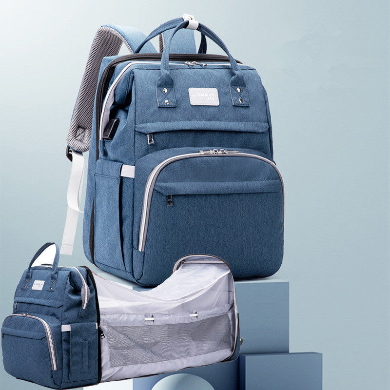 Spacious Diaper Bag with Built-in Foldable Crib